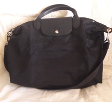 Sac noir Longchamp avec sa bandoulière