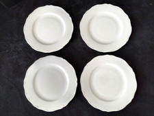 4 Assiettes  à dessert en porcelaine de Limoges blanche