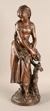 Mathurin MOREAU  "Paysane au retour de moisson" Bronze à patine brune 57 cm