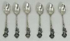 6 cuillères à moka argent massif allemand, ajourées, fleuries.