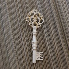 Vintage broche cle fantaisie