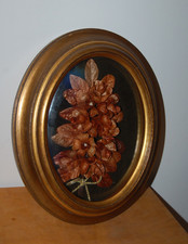 Cadre verre bombé et fleur en