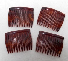 Lot 4 peignes à cheveux