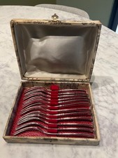 Lot de 12 fourchettes à escargots en inox . Vintage