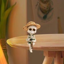 Statue de squelette de pêche