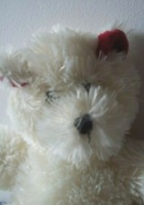 Peluche ours oreilles rouges