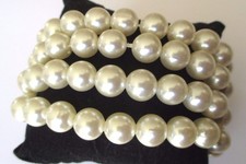 bracelet bijou fantaisie élastique 4 rangs de perles en résine nacrée blanc 637
