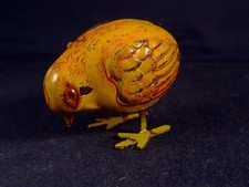 Ancien jouet automate mécanique tôle poussin picorant oiseau Vébé 510 France 