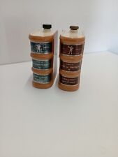 Deux Anciennes bouteilles en forme de livre de la bibliothèque George Monin