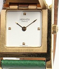 Montres HERMES Medor ME1.201 or/vert cadran blanc plaqué or/cuir