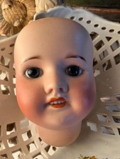 Tête de poupée ancienne en