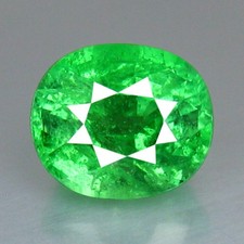 1.39CTS 6.70X5.70 MM OVALE TANZANIE 100% NATUREL TSAVORITE GRENAT VERT...