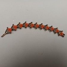 Kramer petit bracelet métal doré et lucite saumon années 60
