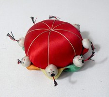 pique aiguilles / épingles