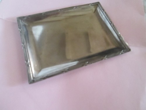 Vide poches argent poincon - en,