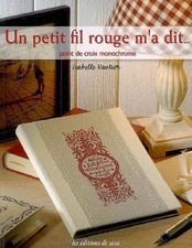 UN PETIT FIL ROUGE M'A DIT