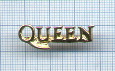 Pin's vintage badge logo doré