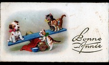 CHATS & CHIENS / JEU de BALANCOIRE TAPE-CUL / BONNE ANNEE