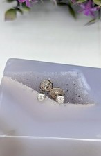 Boucles d'oreilles chacune sertie d'un diamant d'environ 0,05ct Or 750 Millième