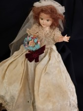 ANCIENNE POUPEE MUSICALE