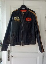 Blouson style moto de la marque italienne RARE   Cuir  effet vieilli
