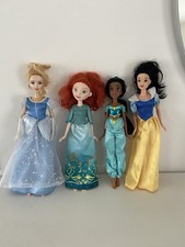 Lot 4 poupées Disney -