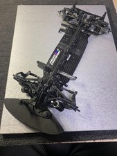 Voiture RC Mugen Seiki MTC2 châssis d'occasion configuration du cours...