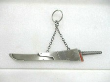 Coupe papier en métal décoratif " Sabre avec son fourreau "