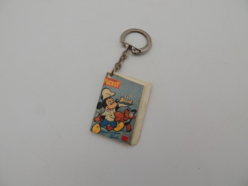 Disney porte clé le journal - le,