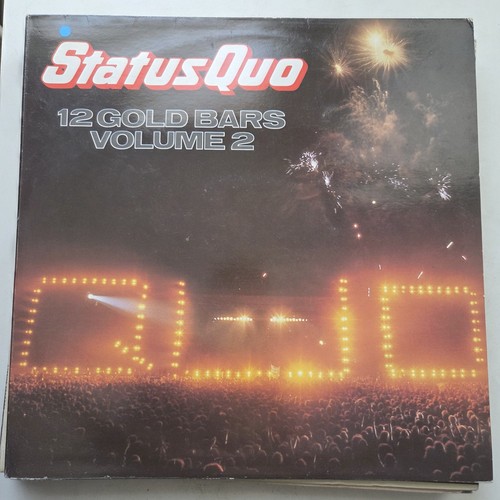 Status quo gold bars - status,