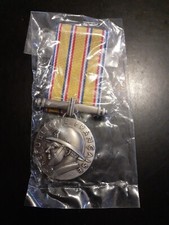 MEDAILLE DECORATION HOMMAGE AU DEVOUEMENT MINISTERE INTERIEUR Grise