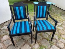 2 fauteuils en bois noir