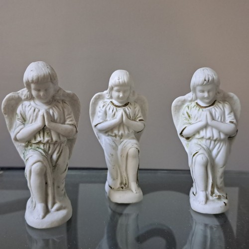 Angelots anciens porcelaine - en,