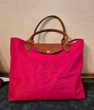 Véritable sac longchamp le pliage rose framboise , 48 cm x 30 cm