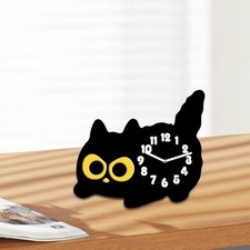 Horloge de chat sur table