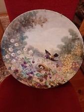 rare plat en faience signe