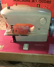 Ancien jouet, machine à