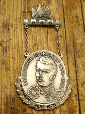 Médaille broche