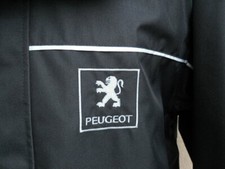 Véritable blouson PEUGEOT quasiment neuf bleu marine logo peugeot lion psa