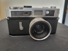 appareil argentique télémétrique Canon 7 + jupiter 12