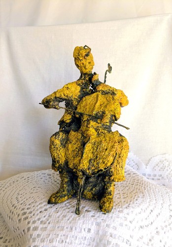 Violoncelliste jaune - le,