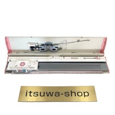 Machine à tricoter Brother