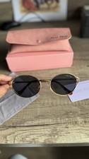 Lunettes de soleil MIU MIU
