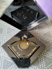 Une Miniature De Parfum Sergio