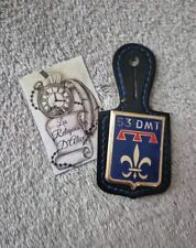 Insigne / pucelle 53 e