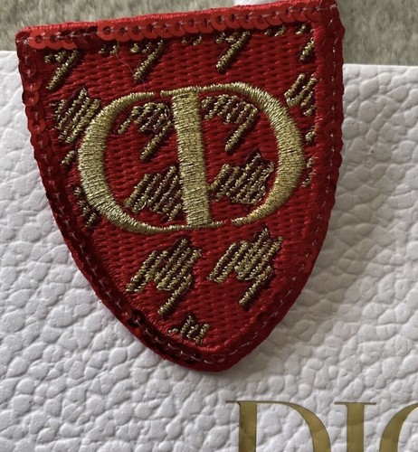 Broche badge dior once - badge**, **once