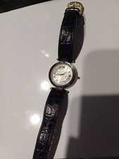 montre balmain femme, ronde, cadran décoré, cercle autour bleu marine