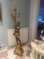 torchère à décor d'un nubien en bois et stuc doré hauteur 1m70