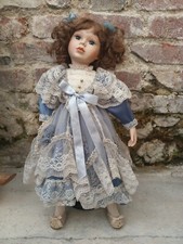 Poupée de collection tête porcelaine