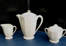 Badonviller demi-porcelaine  tête de service à café blanc et liseré platine